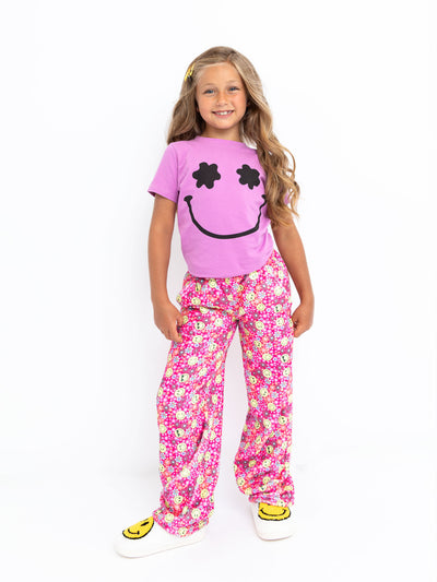 girls pink plush loungewear pant with floral print and smiley faces