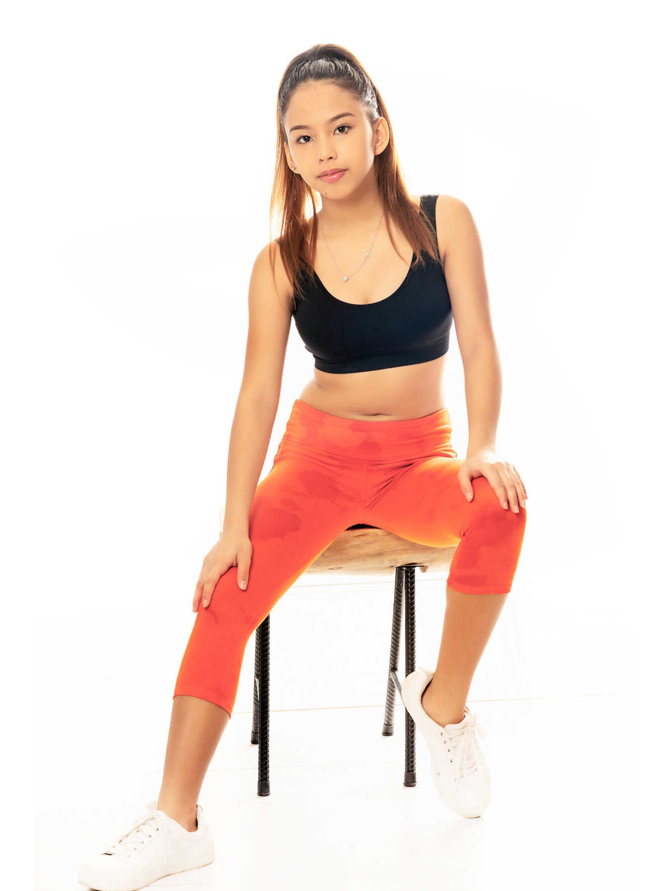 Shop Capri Orange Leggings  Girls Apparel & Activewear by Limeapple